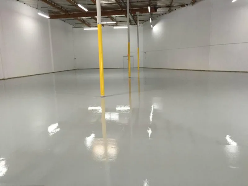 Glossy white epoxy floor in a warehouse
